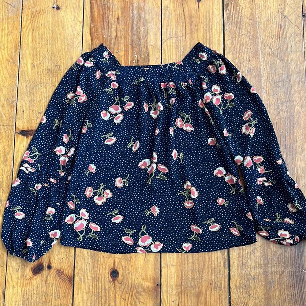 Navy blue top with pink flowers and gold dots